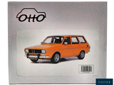 a picture of an orange car on the cover of a magazine