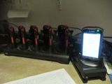 a cell phone that is sitting on a charging station