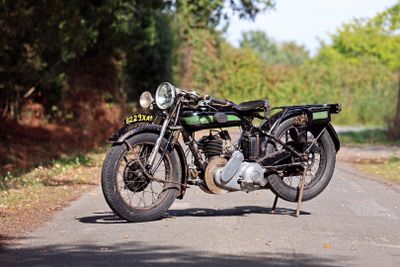 a motorcycle that is parked on the side of the road
