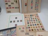 many different types of stamps on a table