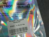 a bag with a label on it sitting on a table