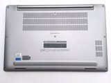 a laptop that is sitting on a white table