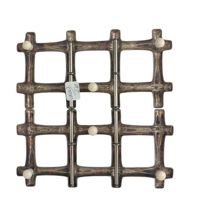a close up of a wooden wine rack on a white background