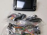 a close up of a car radio with a bunch of wires on it