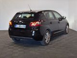 a picture of a small black car parked in a room