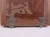 a wooden box with a picture of a ship on it