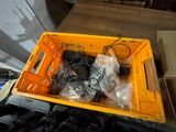 a yellow box full of wires and wires on top of a table