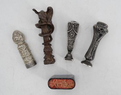 several different types of metal objects are displayed on a white surface