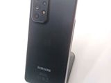 the back of a black samsung galaxy s20 with a camera on top of it