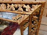 a mirror that is sitting on top of a table