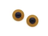 a pair of gold and black earrings on a white background