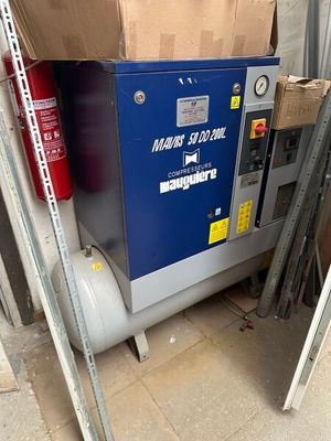 an image of a compressor with a box on top of it