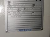 a picture of a white refrigerator with a sign on it