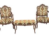 two chairs and a bench with a floral upholstered seat