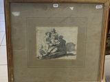 an old picture of a man sitting on the ground next to a dog