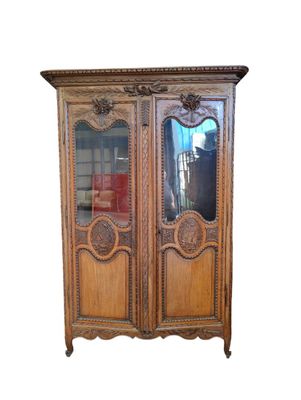 an image of a wooden cabinet with a mirror on top of it