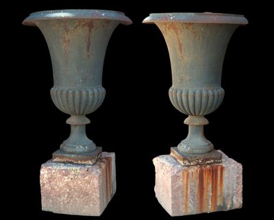 two vases that are sitting on top of each other
