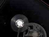 a diamond in the center of a black box