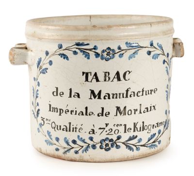 an image of a ceramic jar with writing on it