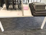 a table with a bunch of electronics on top of it