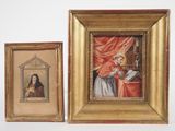 two framed pictures of a woman in a red dress and a woman in a white dress