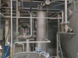 pipes and valves in a large room with a lot of pipes