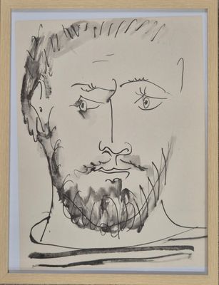 tableau représentant un homme barbu et moustachu, dans un cadre en bois