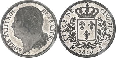 a close up of a coin with a crown on top of it