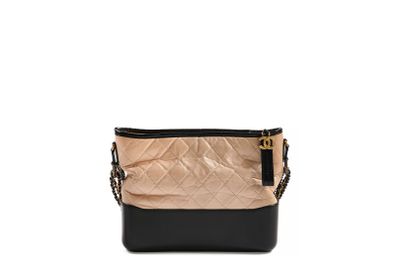 a small black and gold bag with a chain strap