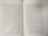 an open book that has a picture of a cat on it