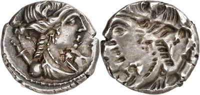 a silver coin with an image of a man and a woman on it