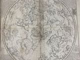 an old map of the world in a book on a white background