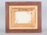 an old wooden picture frame with a picture of a star on it