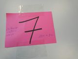 a pink post it note with the number four on it
