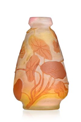 a glass vase with a floral design on it