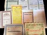 several different types of certificates are displayed on a black surface