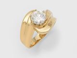 une bague en or 18 carats sertie d'un seul diamant au centre