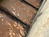 a close up view of a set of stairs in a garden