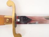 a knife that is laying on top of a table