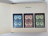 a book with four different stamps on it
