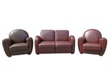 three pieces of leather furniture including a reclining chair, a reclining chair and a reclining chair