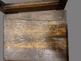 a close up of a piece of wood on a table