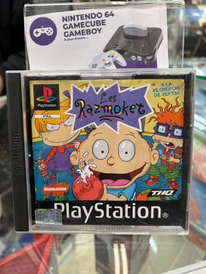 an image of a nintendo 64 game console with a box of games on it