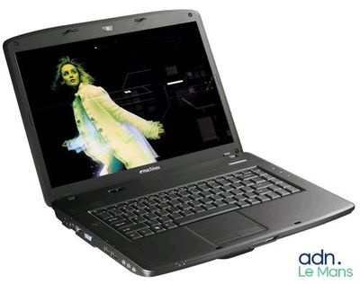 a laptop with a picture of a woman on the screen