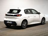 a picture of a white car parked in a garage
