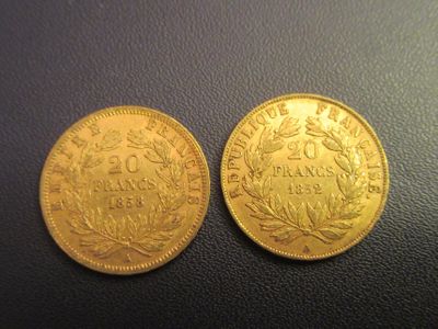 two gold coins, one of which is a sovereign and the other of which is a sovereign