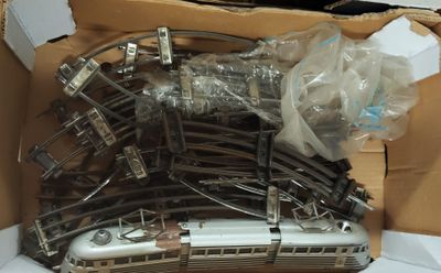 a box with a bunch of train tracks in it