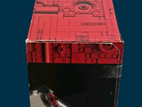 a red box with a lego star destroyer inside of it