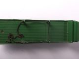 a green box with a chain attached to it