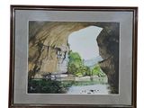 aquarelle encadrée représentant une grotte avec un bateau dans l'eau